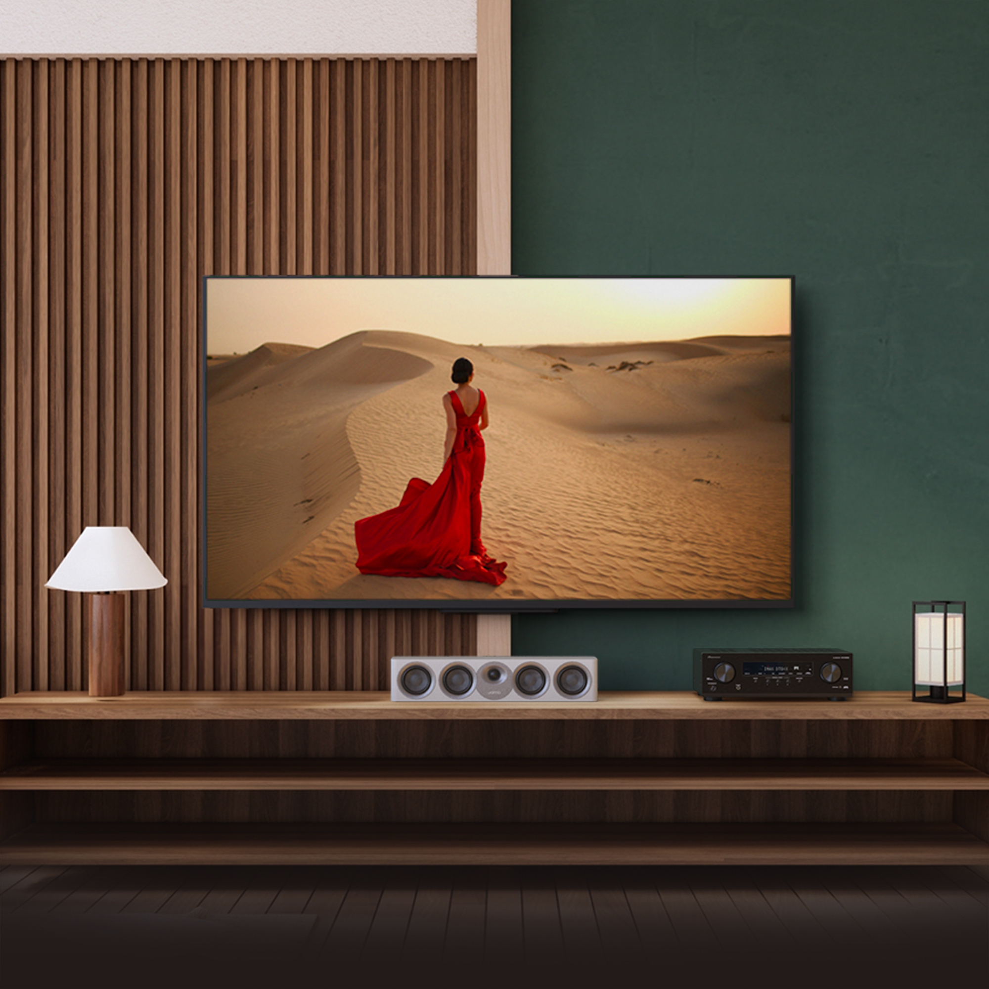 Pioneer VSX 835 powering home Jamo system with red dress woman on tv 2000x2000